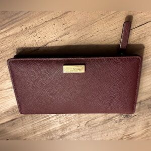 Kate Spade Maroon Slim Bifold Wallet with Gold Accent